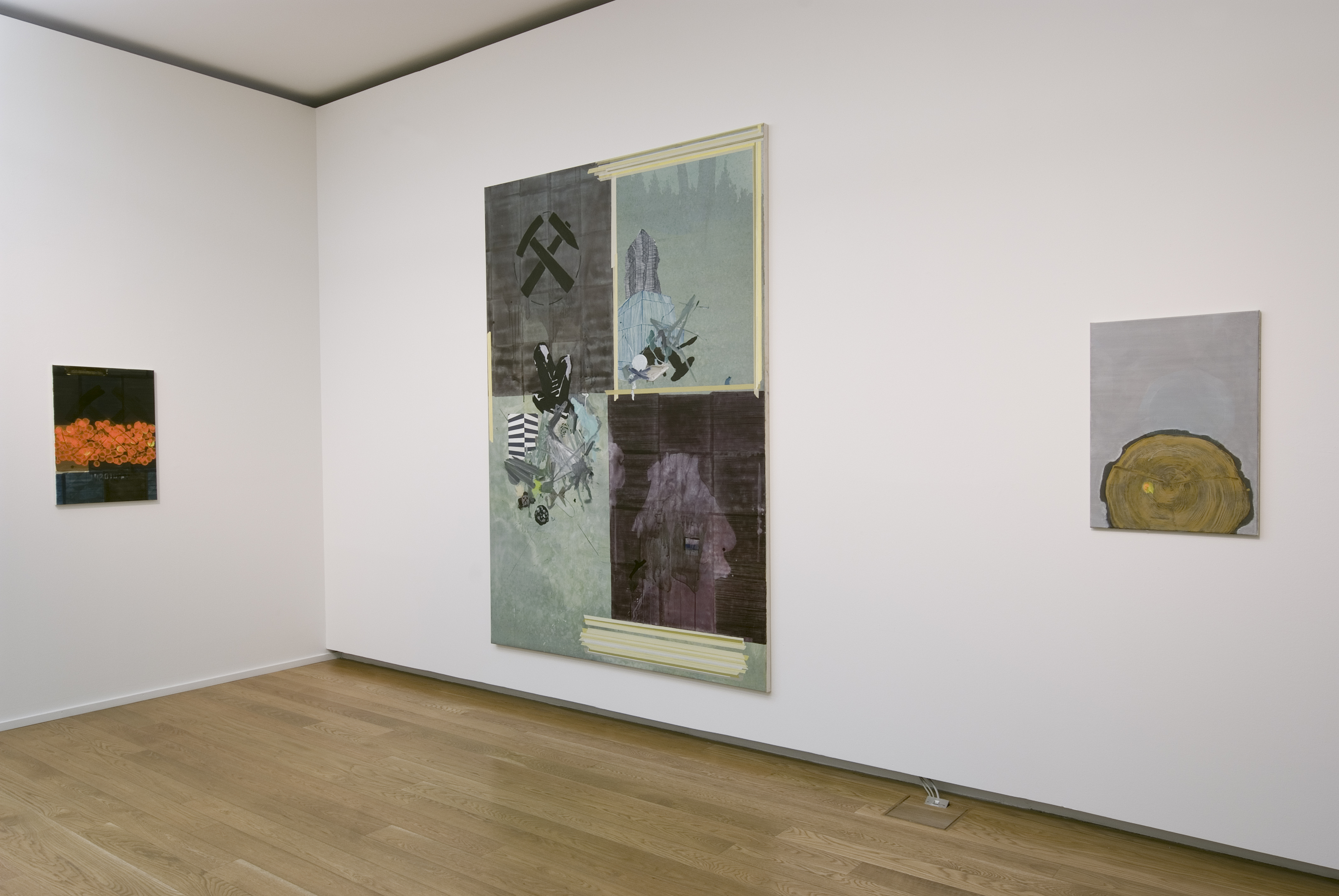 AI generated: The image shows a gallery with three different paintings on white walls. The paintings vary in size and style and are displayed on a wooden floor.
